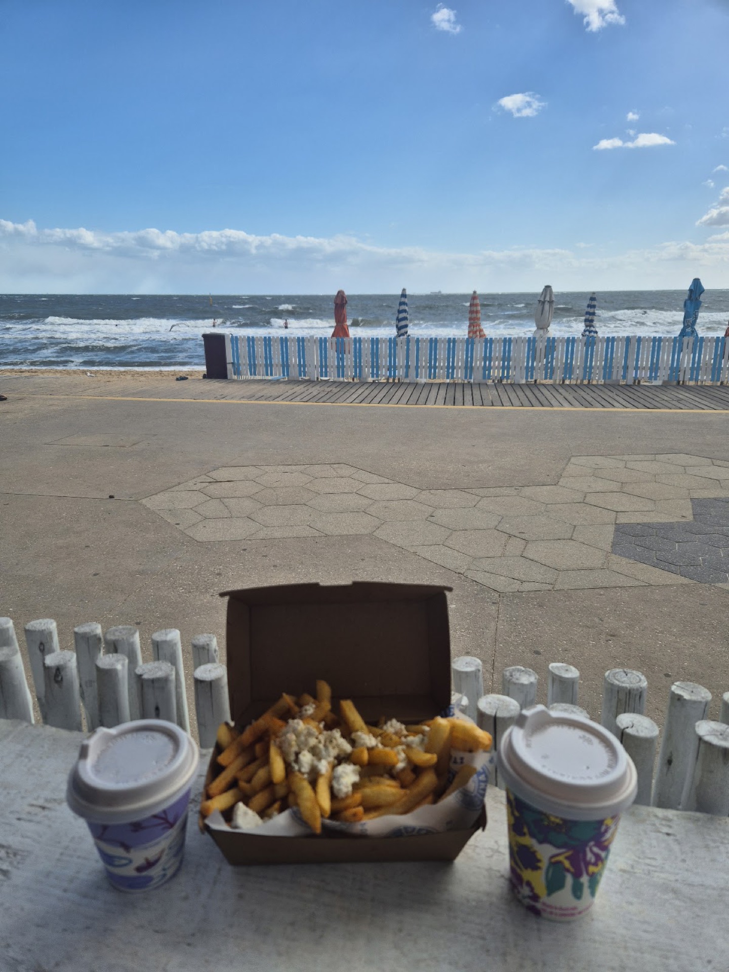 Chips with feta looking out to St Kilda Beach
